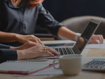 Business owners researching a line of credit