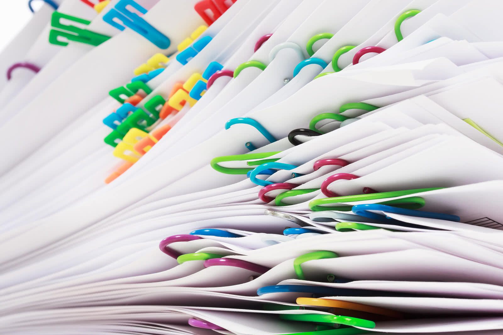 Stack Of Tax Documents With Clips Filing an extension gives you more time to prepare your return, but your taxes are still due.