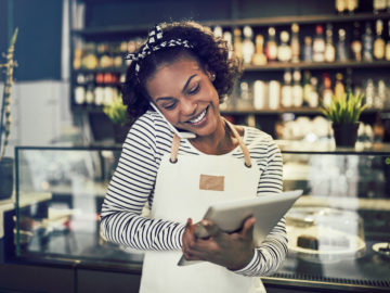 Small business owner researching types of business loans
